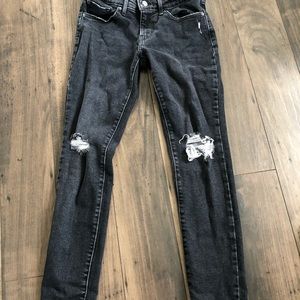 Levi’s 711 black denim jeans